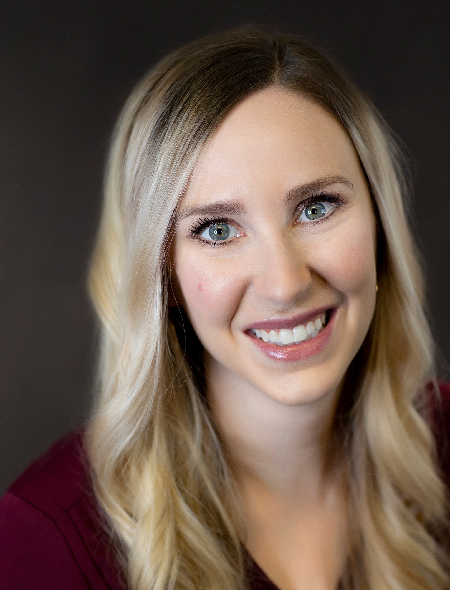 a woman smiling for the camera