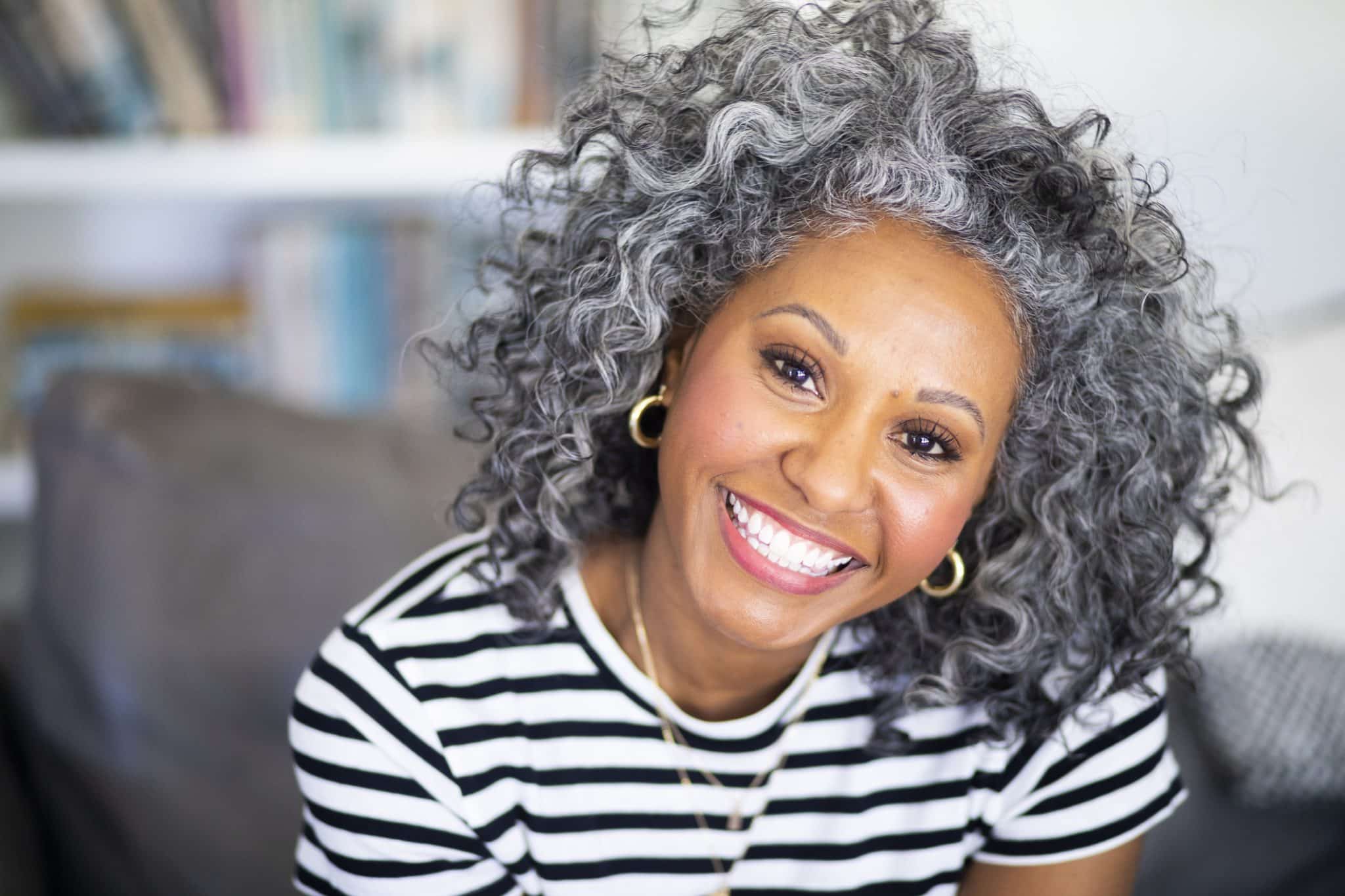 a woman smiling for the camera